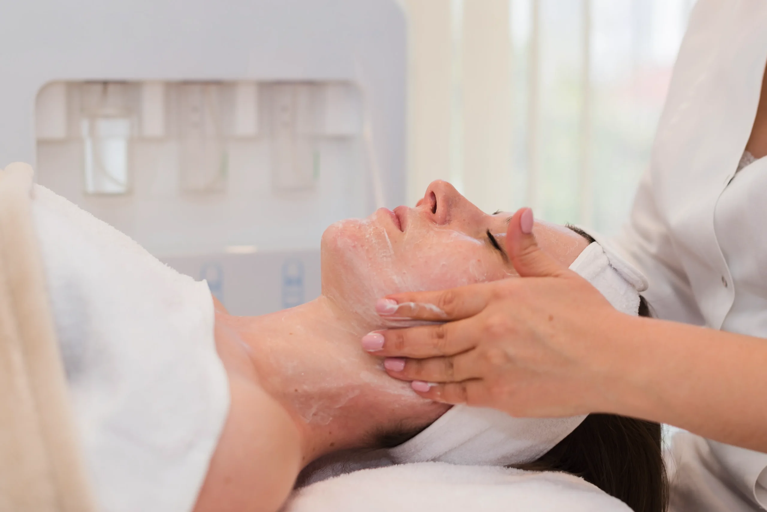 girl-receiving-facial-treatment-beauty-salon-converted-from-jpg